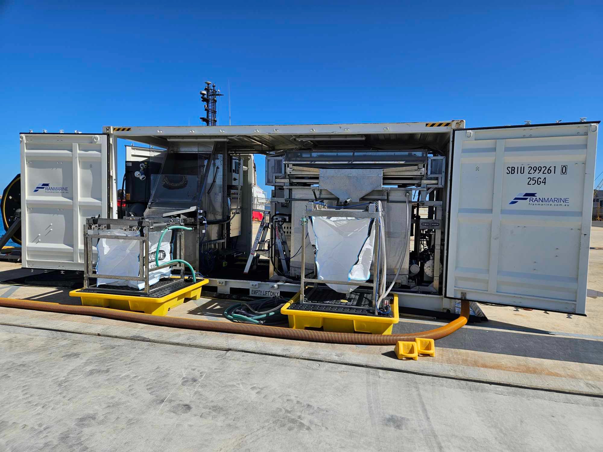 Containerised filtration plant operating on a quayside
