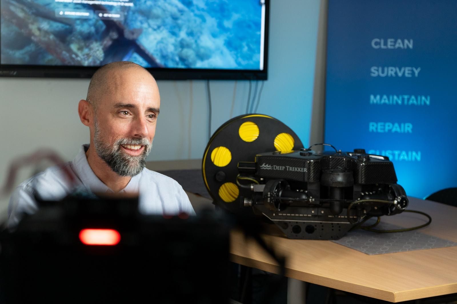 MarineStream spokesperson beside an inspection ROV